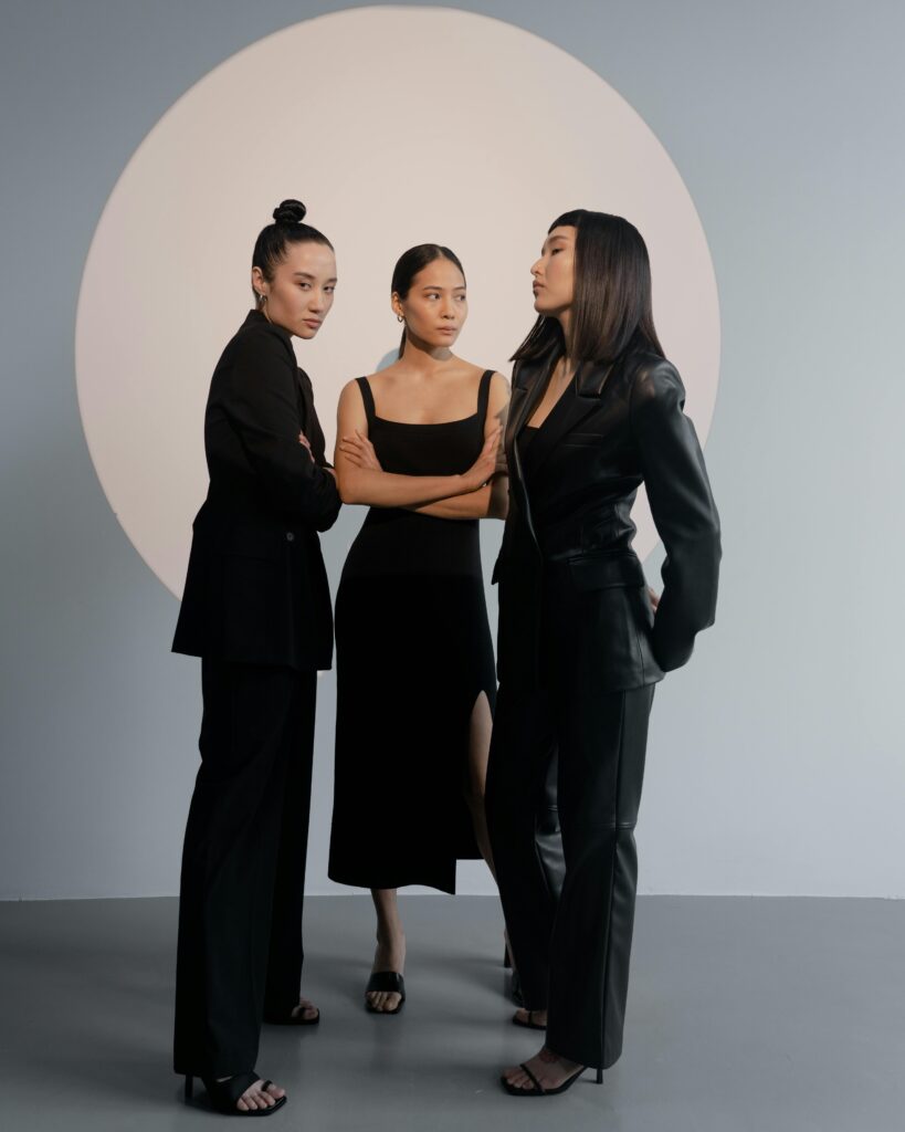 3 model women standing